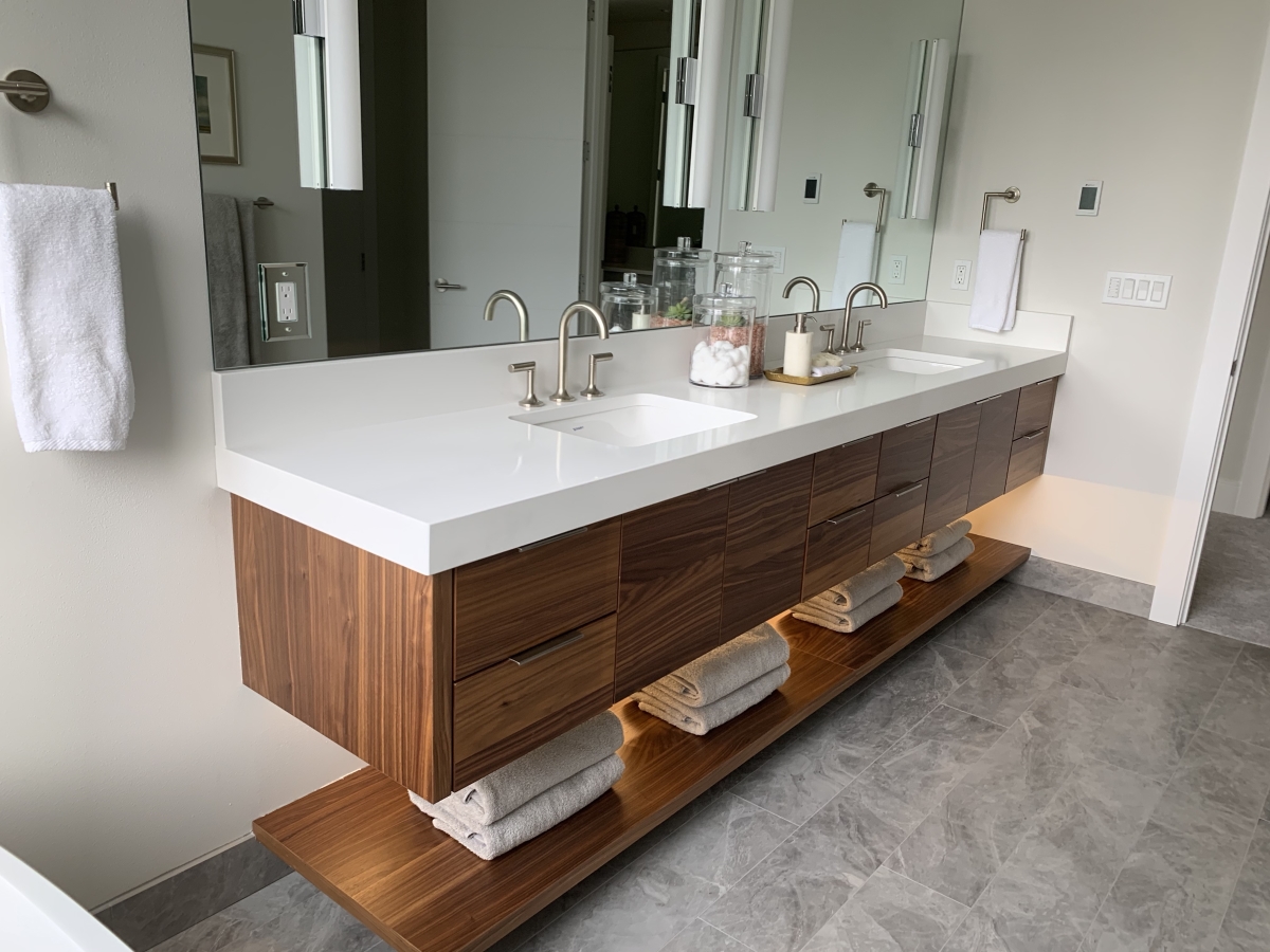 Bathroom counter with towels underneath